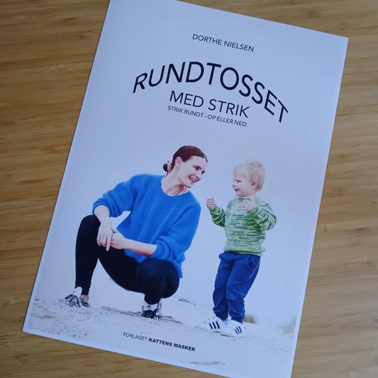 Rundtosset med strik